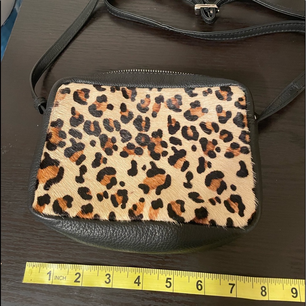 Small faux fur leopard purse.